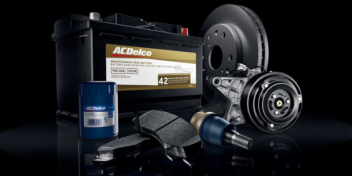 ACDelco battery, oil filter, brake pads and rotor on display, genuine GM parts at Holiday GMC in Graham, TX